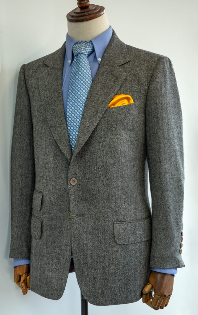 Grey Mens Suit with Blue shirt and yellow pocket square